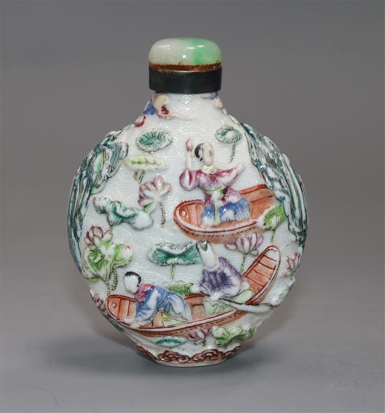 A Chinese moulded famille rose snuff bottle, Jiaqing mark period